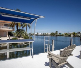 Reel Paradise 2bed 2bath half duplex with brand new private pool, deck & dockage