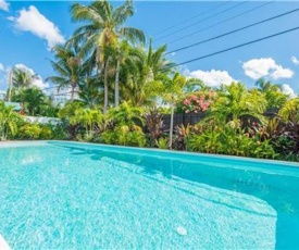 Coco Palm Escape: 5 Min Walk to Beaches, 5 Star Home, 4/2, Feet to BEACH, Heated Pool!