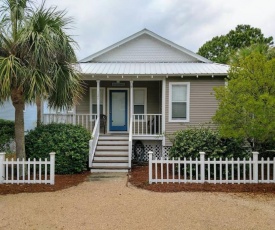 Blue Crab is a Key West style cottage on a quiet street in Barrier Dunes