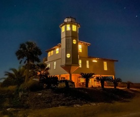 Lighthouse By The Sea