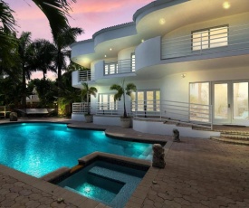 New Listing! Opulent Paradise W/ Pool & 100’ Dock Home