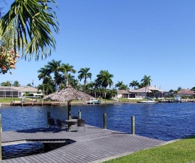 Canal-Front Getaway with Heated Pool & Dock home